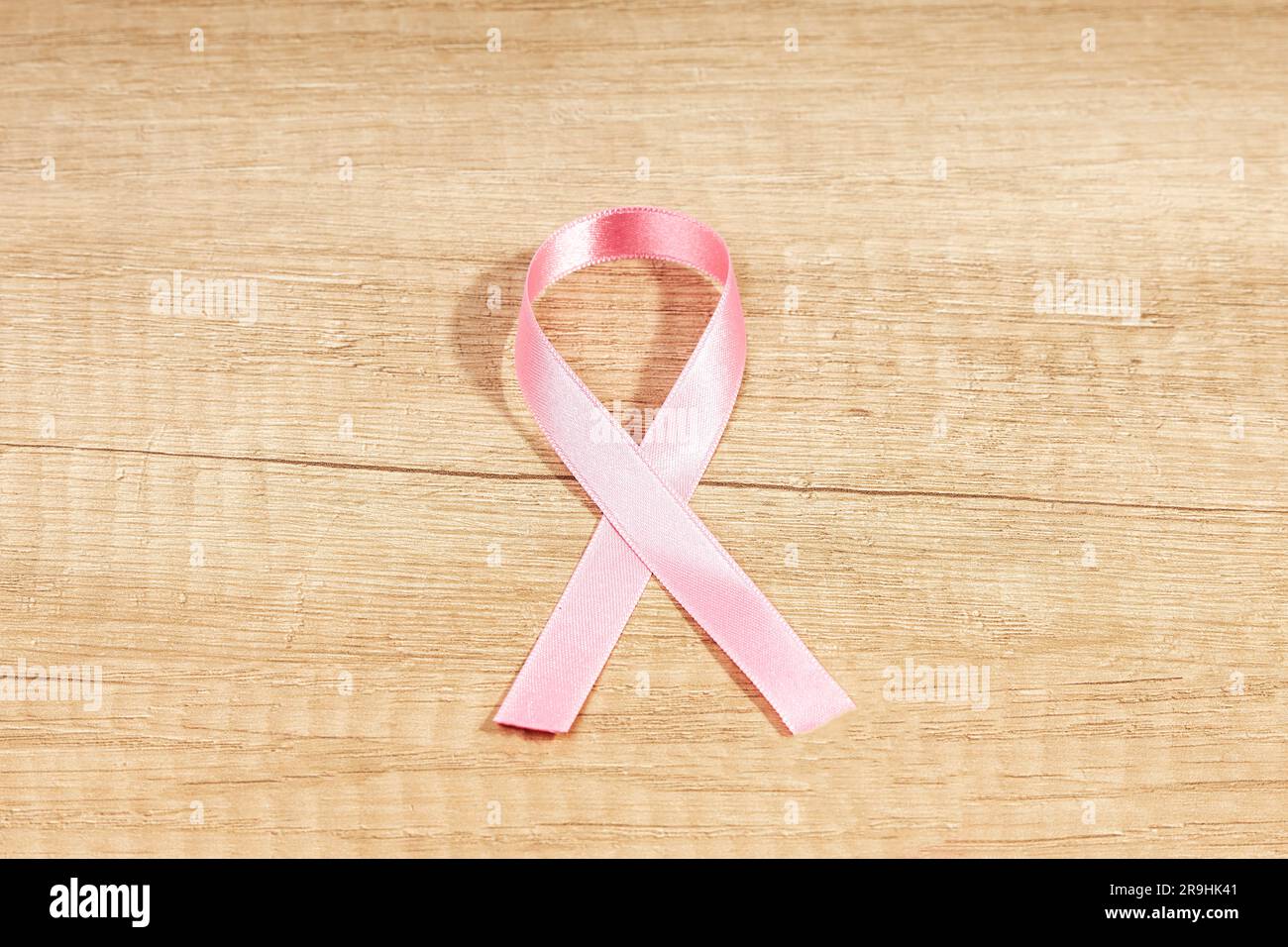 Pink ribbon, a symbol of breast cancer awareness. Fight against cancer Stock Photo