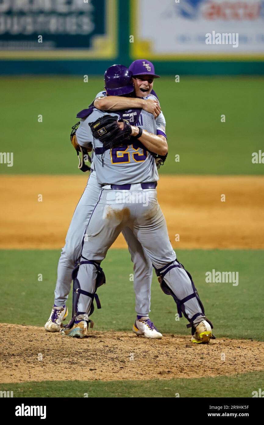 LSU infielder Gavin Guidry celebrates with catcher Hayden Travinski after defeating Kentucky in