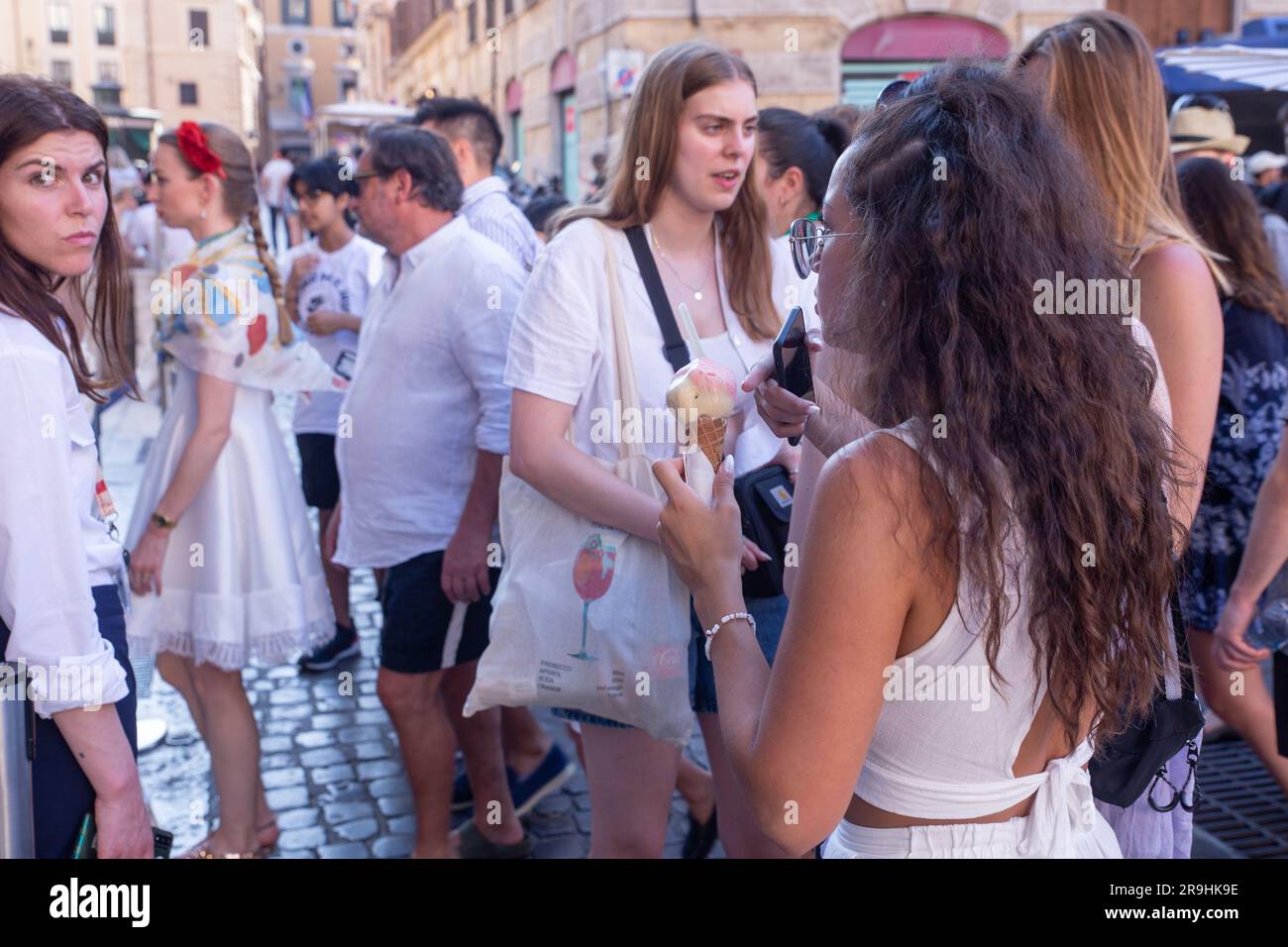 Rome, Italy. 26th June, 2023. A girl eats an ice cream in front of the entrance to the Pantheon in Rome (Photo by Matteo Nardone/Pacific Press/Sipa USA) Credit: Sipa USA/Alamy Live News Stock Photo