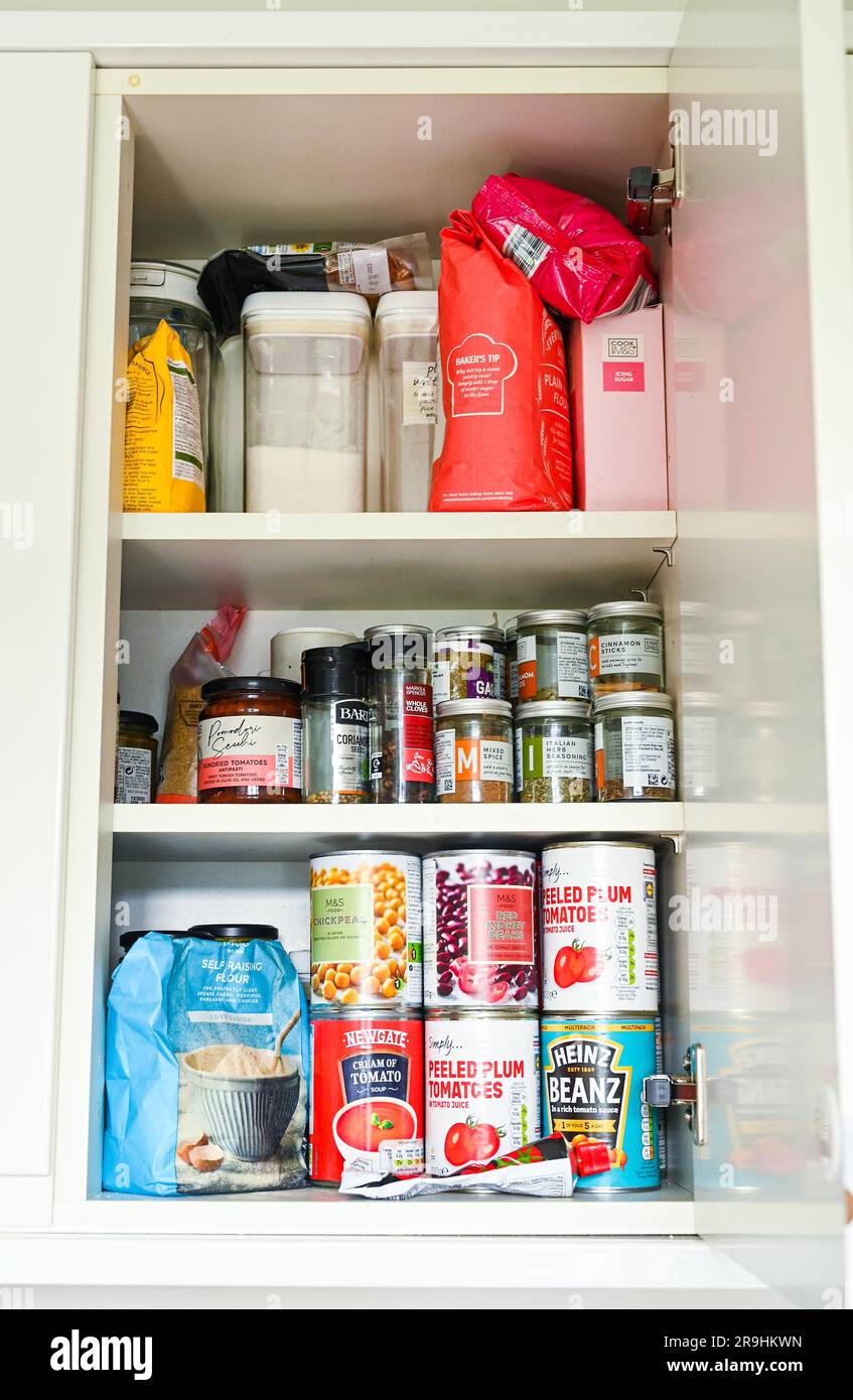Home kitchen store cupboard items including Heinz Baked Beans M&S