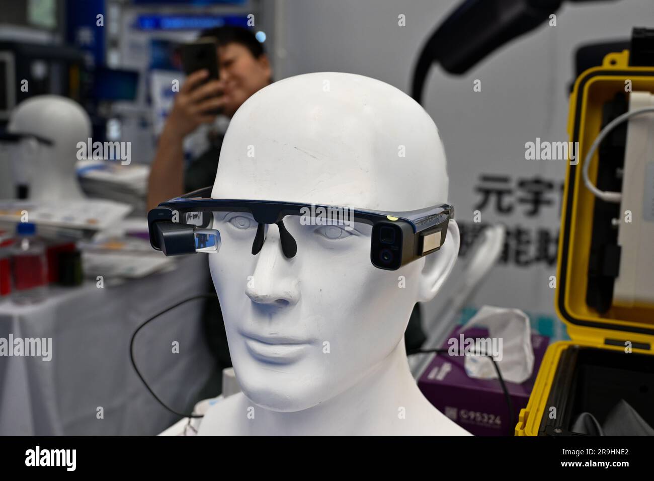 SUZHOU, CHINA - JUNE 27, 2023 - Binocular glasses for receiving remote ...