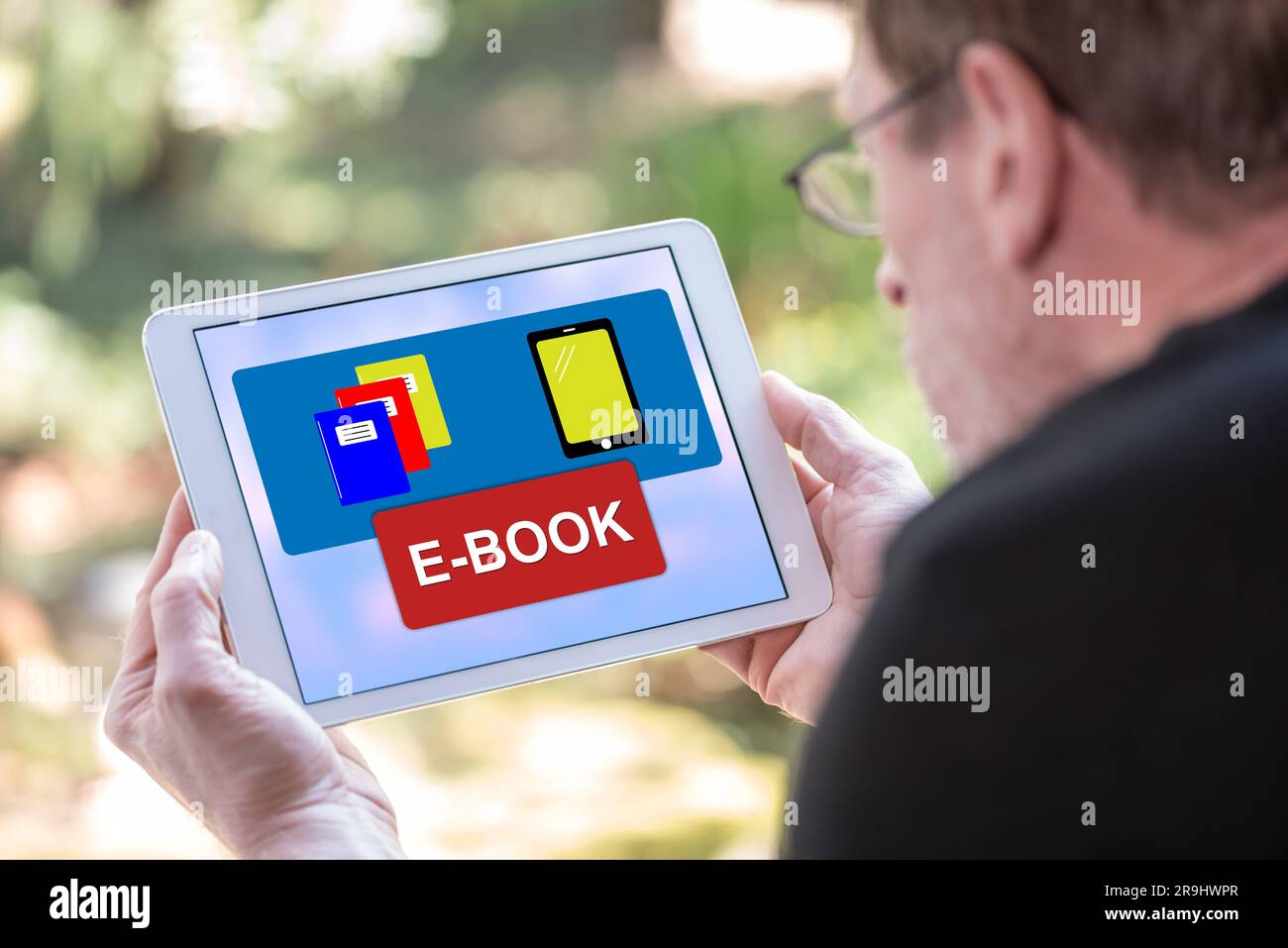 Tablet screen displaying an e-book concept Stock Photo - Alamy