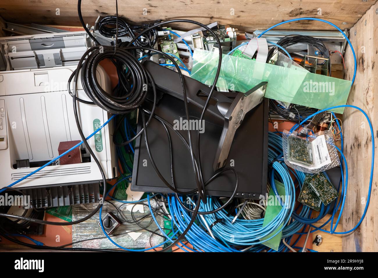 Pile of old electronic devices and cables ready for waste collection or