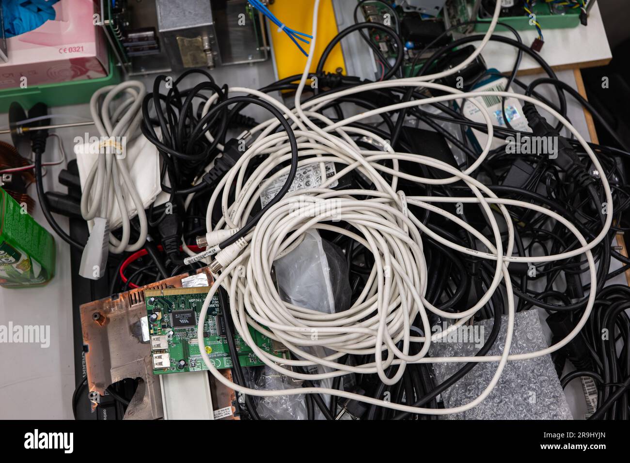 Pile of old electronic devices and cables ready for waste collection or