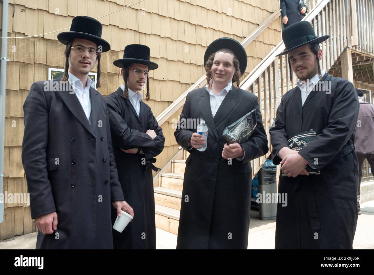 Posed portrait of 4 Hasidic boys including twins. At a synagogue in Monsey, Rockland County, New York. Stock Photo