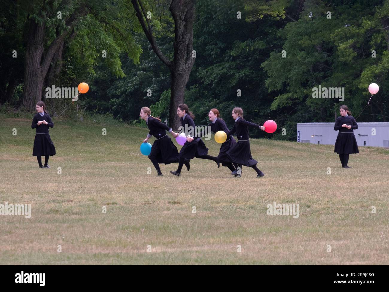 Orthodox Jewish girls celebrate the end of an academic year with a party in at Manny Weldler Park in Monsey, New York. Stock Photo