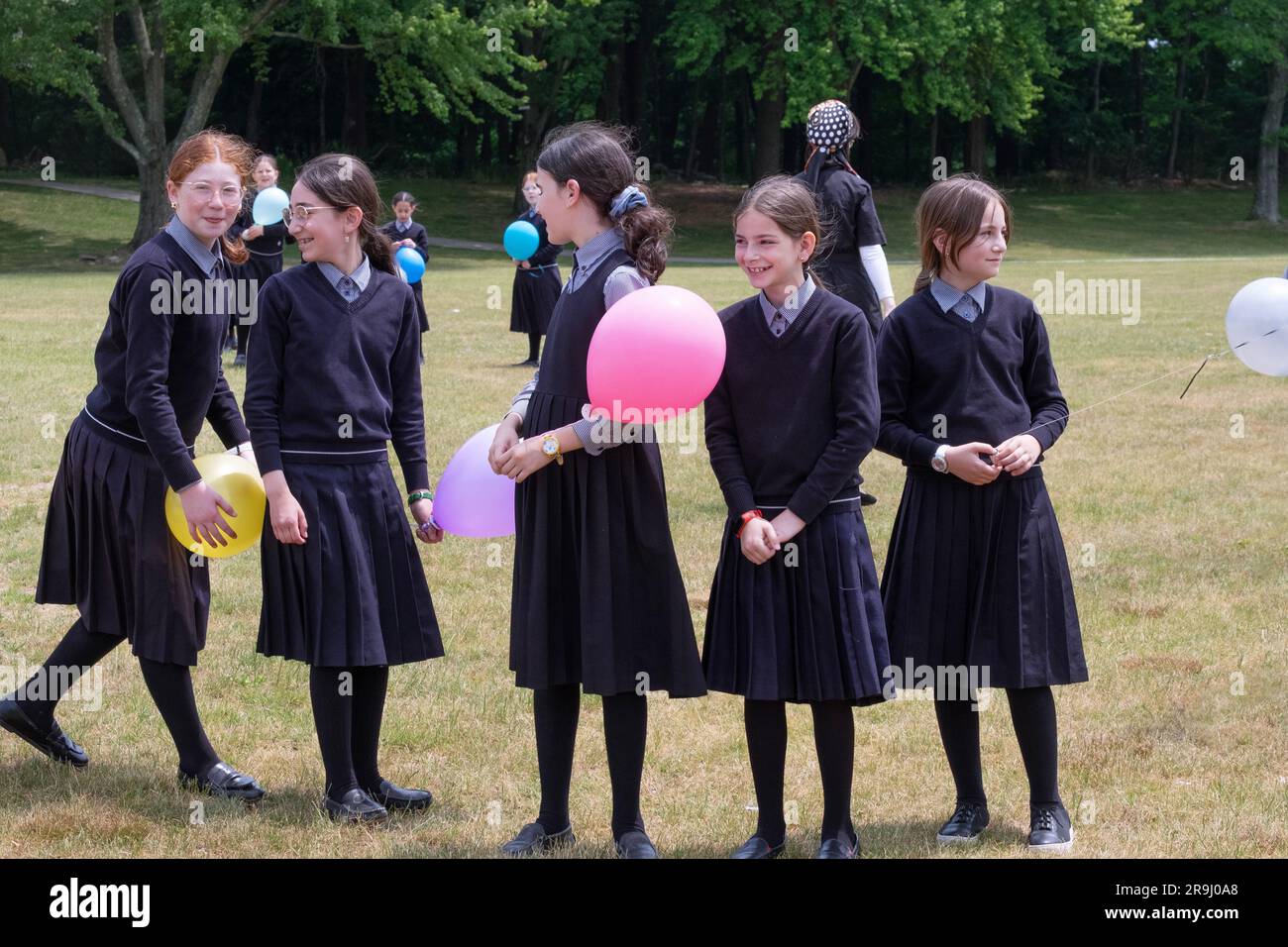 A group of ultra orthodox Jewish girls have a party celebrating the end of the school year/ at Manny Wweldler Park in Monsey, Rockland County New York. Stock Photo