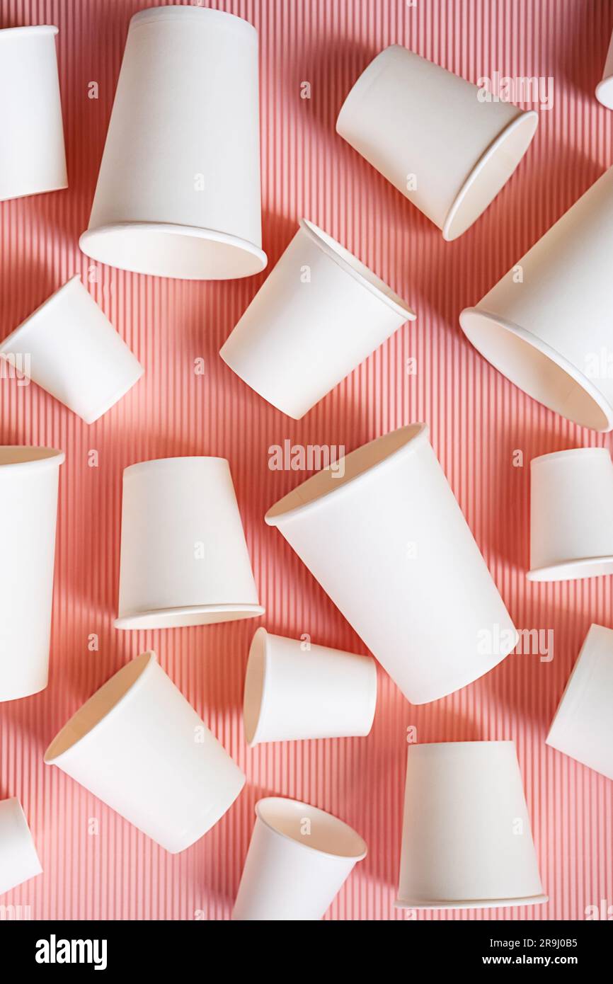 Various sized disposable coffee cups. Different takeaway coffee cups. Stock Photo
