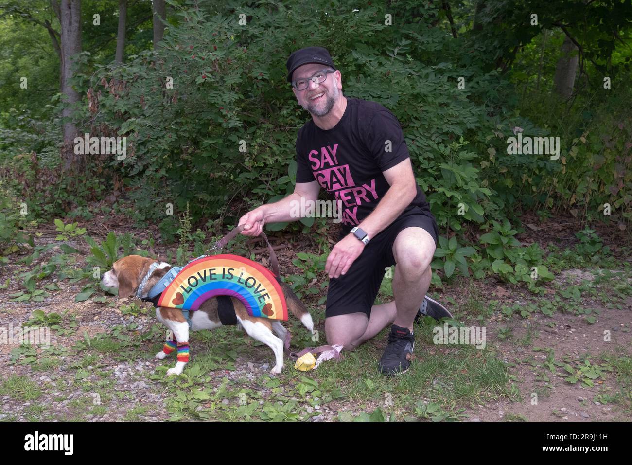 Roxy the beagle and her owner, participants in the Pet Pride Parade at the Pride in the Park event in Lewisboro, Westchester, New York. Stock Photo