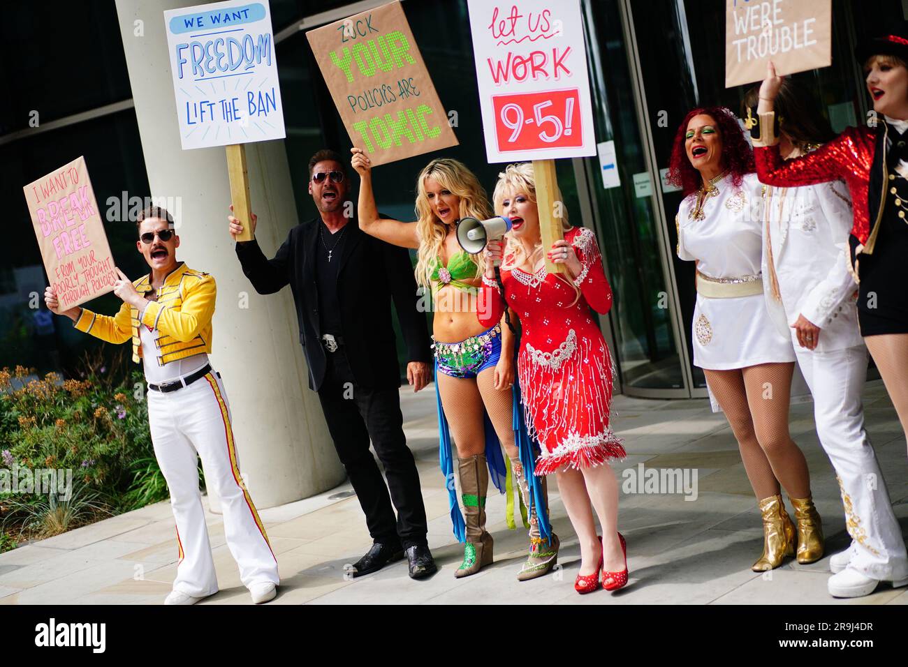 Celebrity impersonators banned from Facebook protest outside the