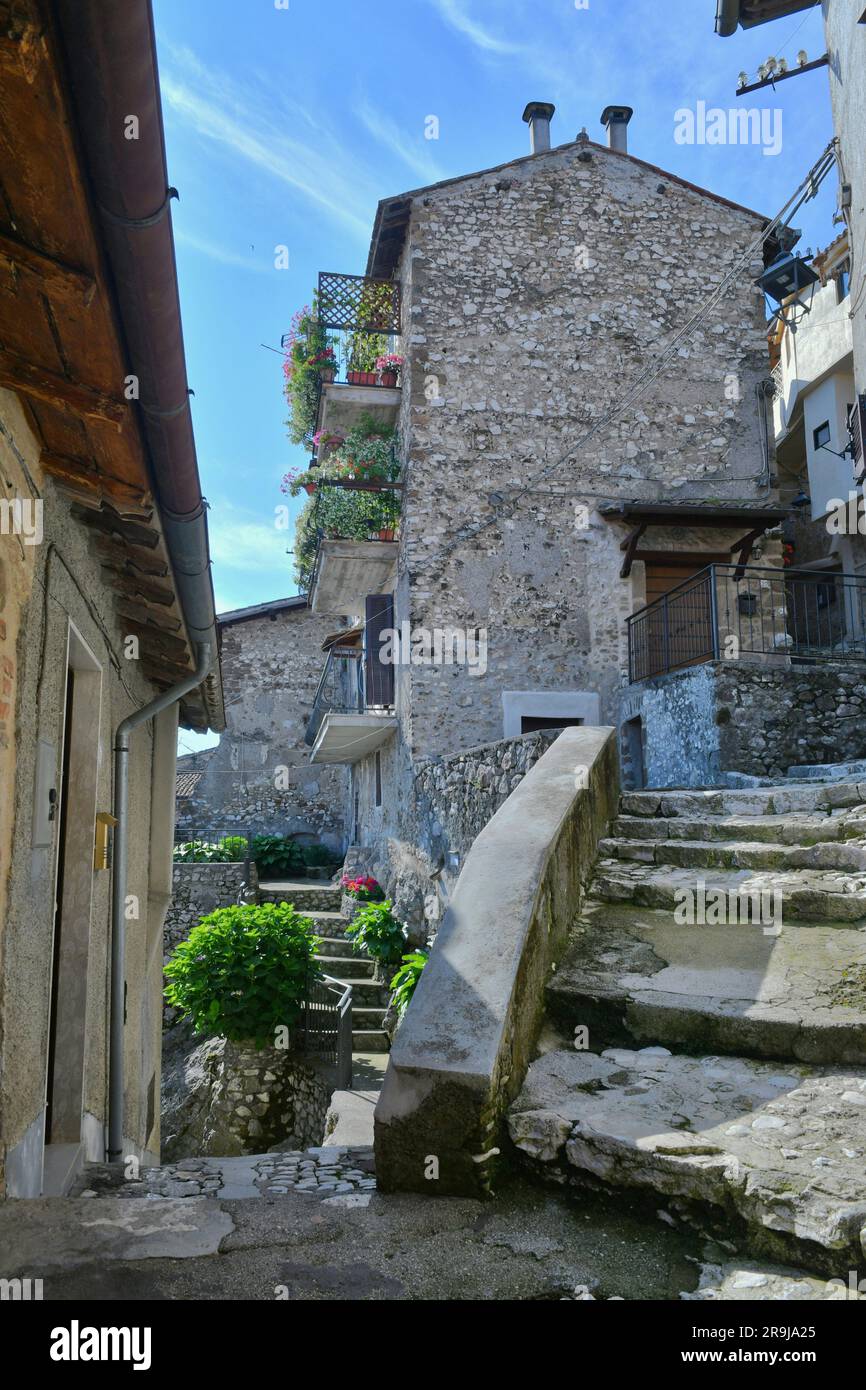 A narrow street between the old houses of Artena, a medieval town near