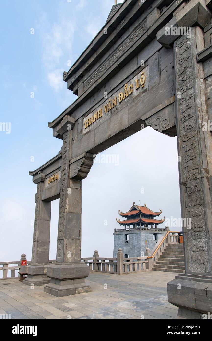 Sa Pa, Vietnam-April 2023; Low angle view of entrance gate on the summit of Fanxipan Mountain leading to the bronze Great Amitabha Buddha statue Stock Photo