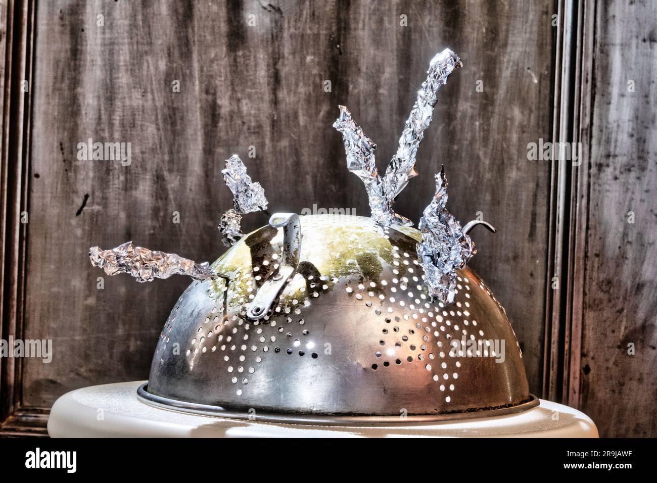 A tinfoil hat created to protect against the superstition of extraterrestrial activity and paranormal occurrences, 2023, United States Stock Photo