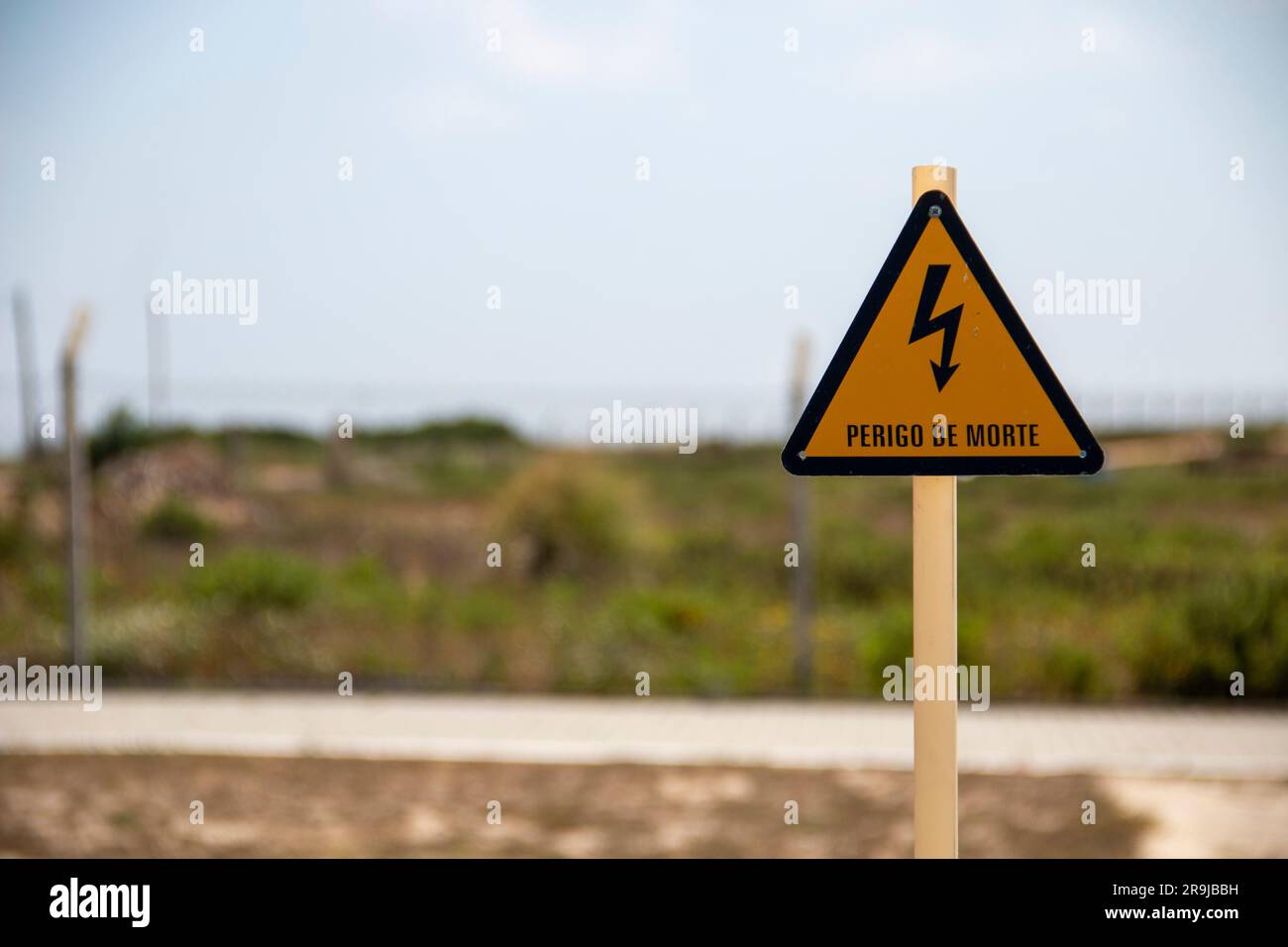Electrical hazard sign, yellow triangle with a black lightning bolt