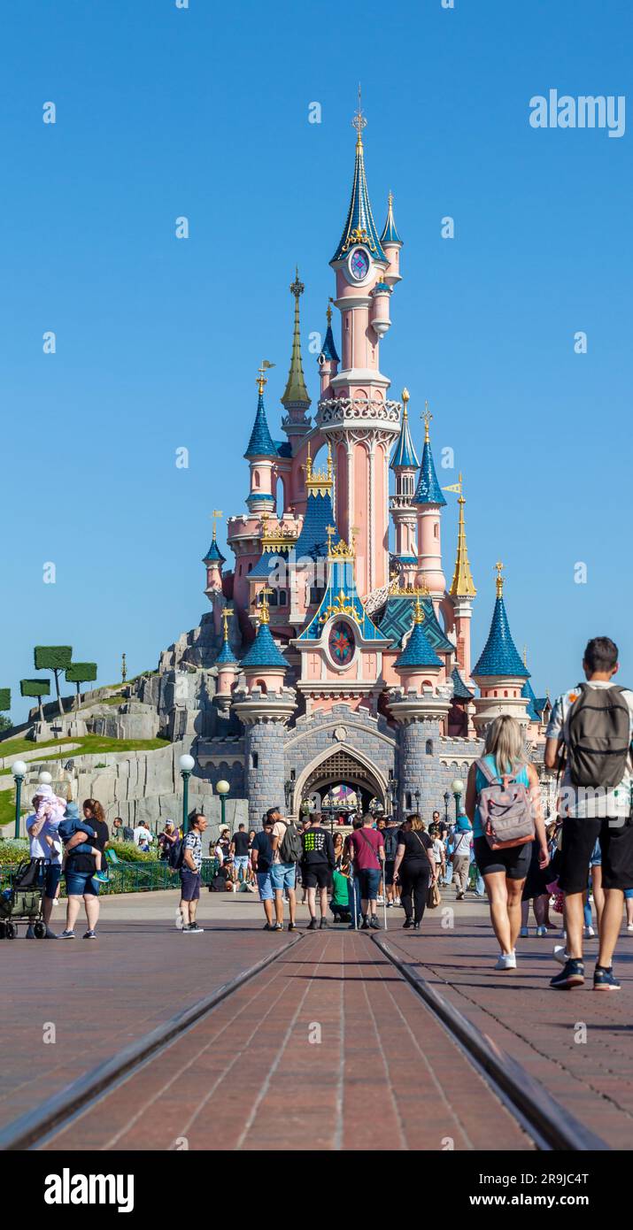 Paris, France - June 02, 2023: Le Château de la Belle au Bois Dormant is the fairytale castle at the center of Disneyland Park in Paris. Castle photographed in the early morning light. Stock Photo