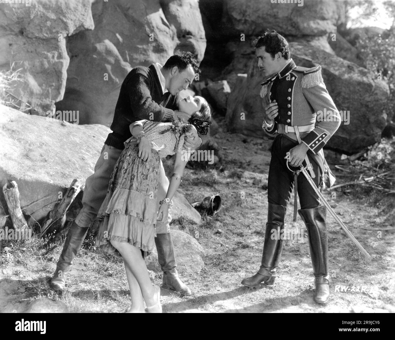 Director RAOUL WALSH DOLORES DEL RIO and DON ALVARADO on set location rehearsal candid during filming of THE LOVES OF CARMEN 1927 director RAOUL WALSH novel Prosper Merimee Fox Film Corporation Stock Photo