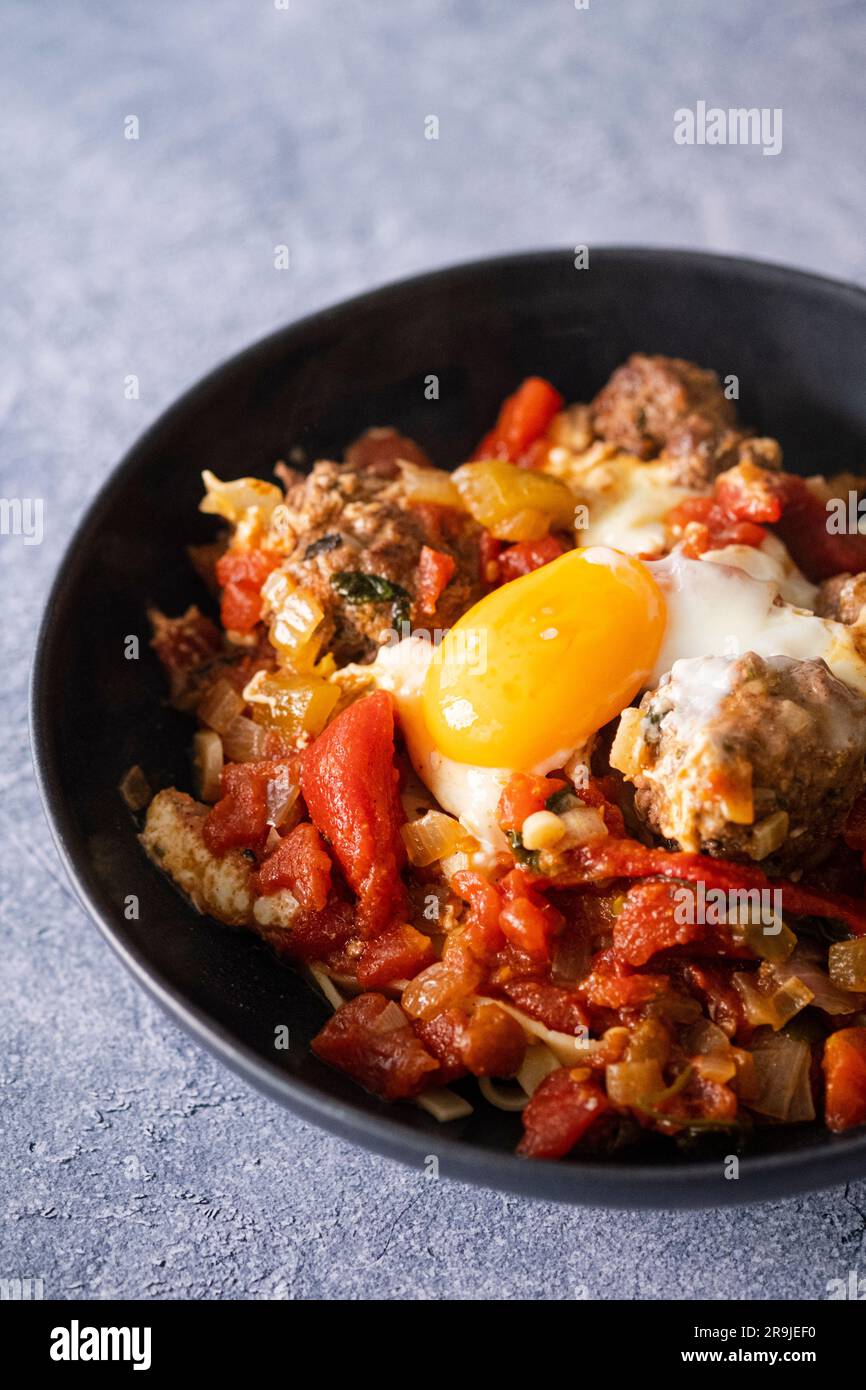 Moroccan meatballs stew with egg Stock Photo Alamy