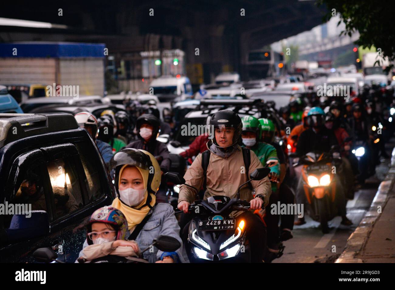 Jakarta. 27th June, 2023. This photo taken on June 27, 2023 shows vehicles moving on a road ahead of Eid al-Adha in Jakarta, Indonesia. Many people left the capital city of Jakarta and headed for hometown ahead of the Eid al-Adha. Credit: Xu Qin/Xinhua/Alamy Live News Stock Photo