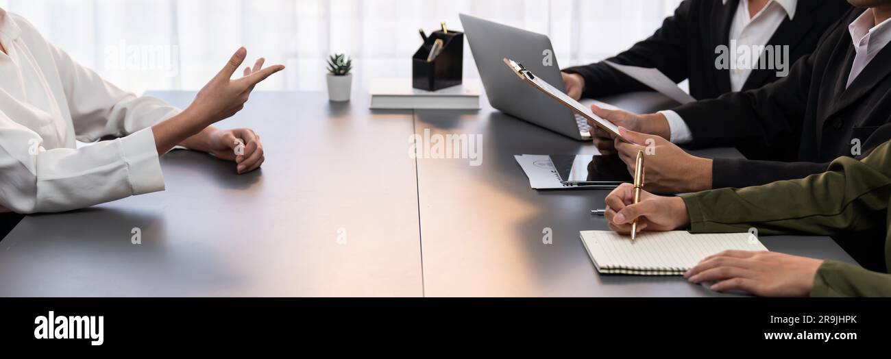 Candidate and interviewers discuss work experience and qualifications