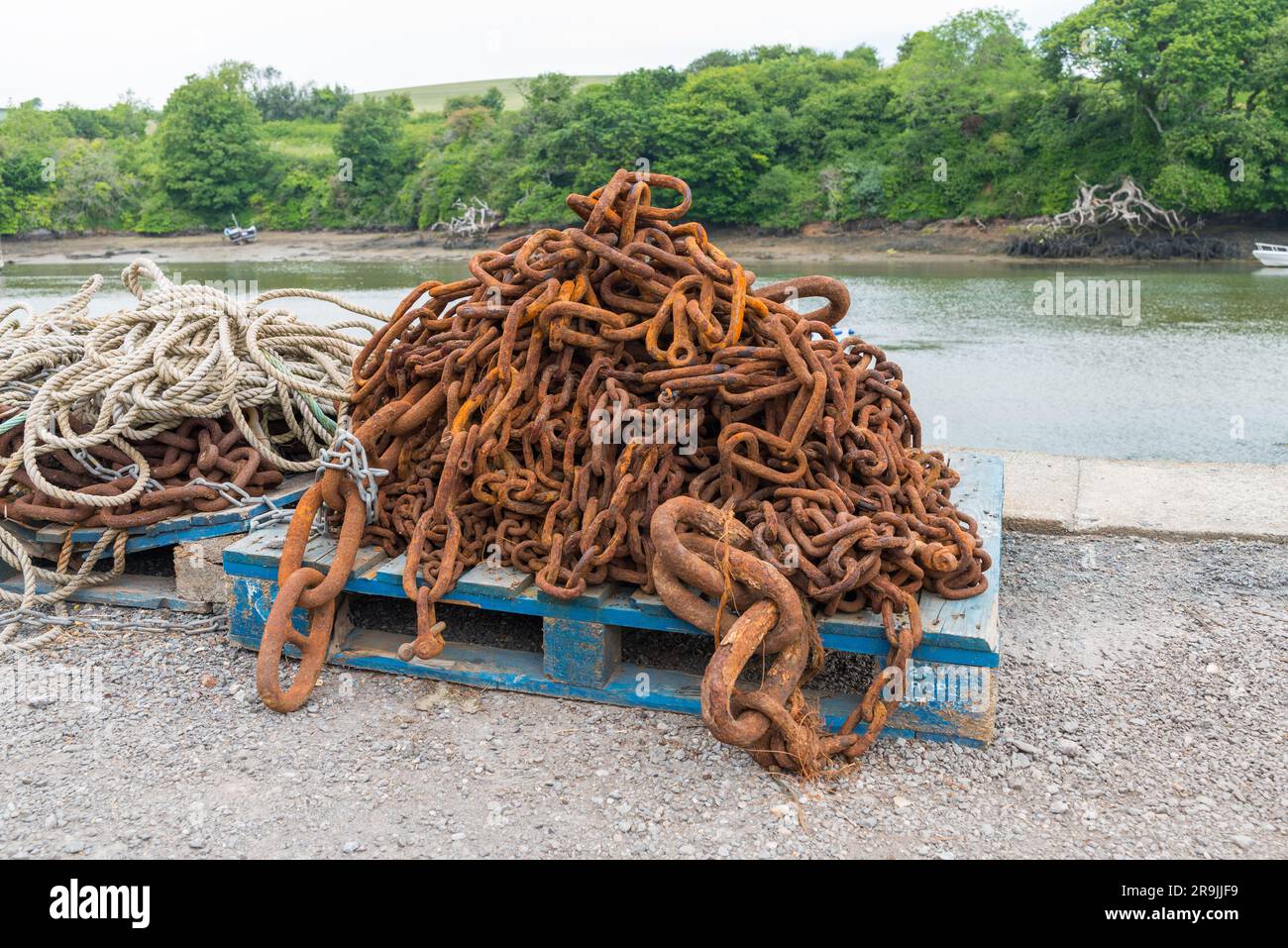 Pile of rusty chains used for securing mooring buoys to the seabed in