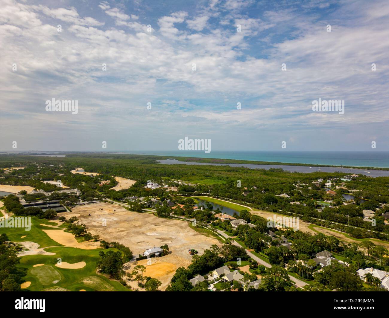 Aerial photo golf course landscape with mansion homes in Hobe sound