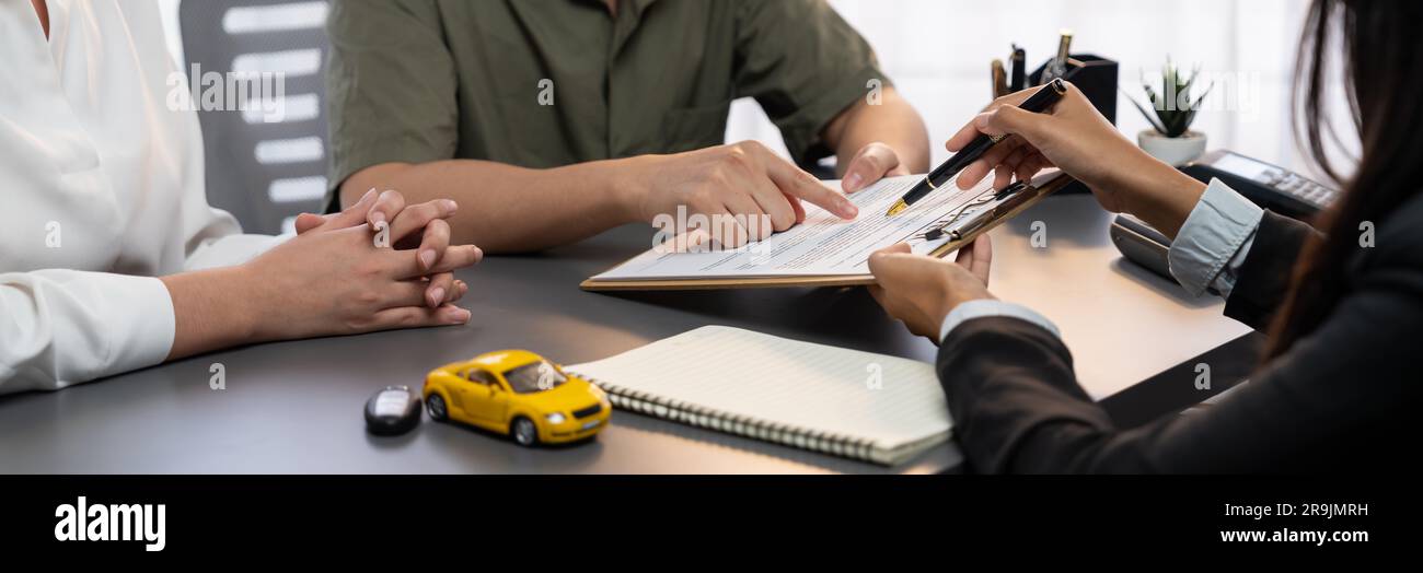 Car dealer calculate interest rate and costs of car loan, offering