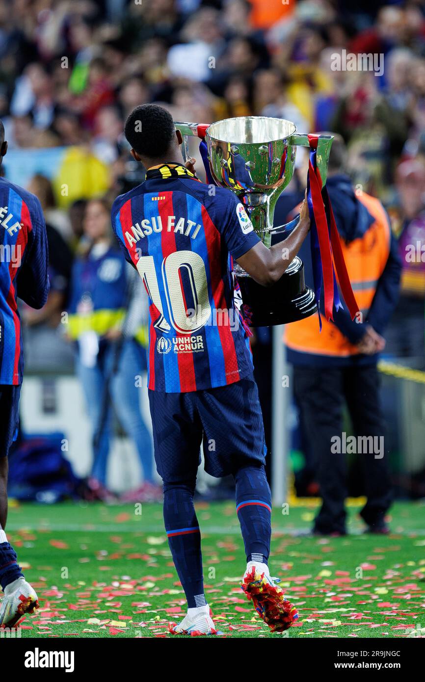 BARCELONA MAY 20 Ansu Fati celebrates with the trophy at the LaLiga