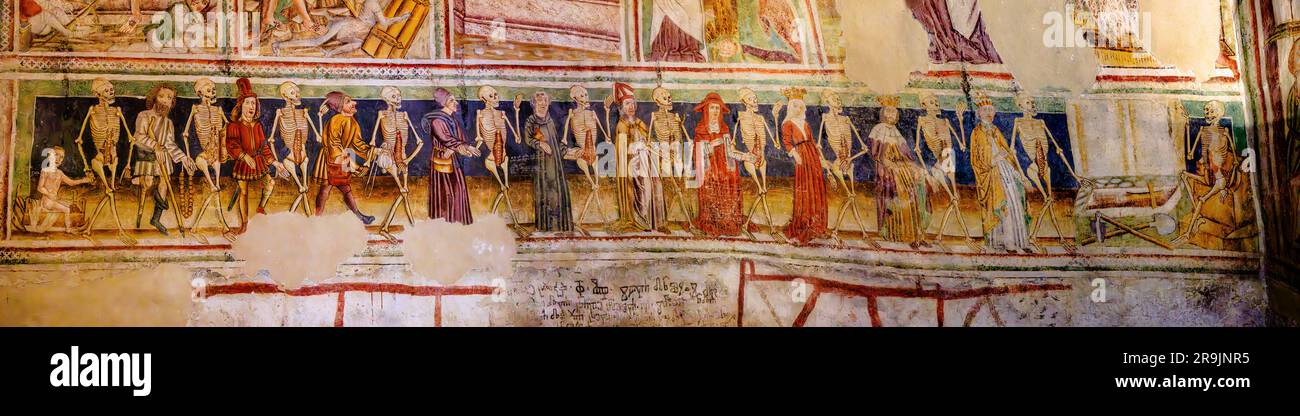 panorama of the whole frescoe of the danse macabre or dance of death on the wall of the church of the holy trinity in hrastovlje slovenia Stock Photo