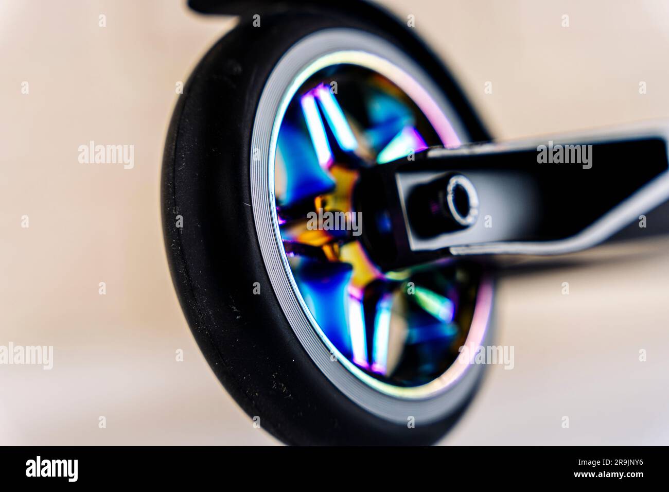 Sæt tøj væk Footpad Gamle tider The rear wheel and brake of a Stunt scooter with rainbow-colored wheels.  extreme skating in the skatepark and on the ramp. Details of the scooter.  Rep Stock Photo - Alamy