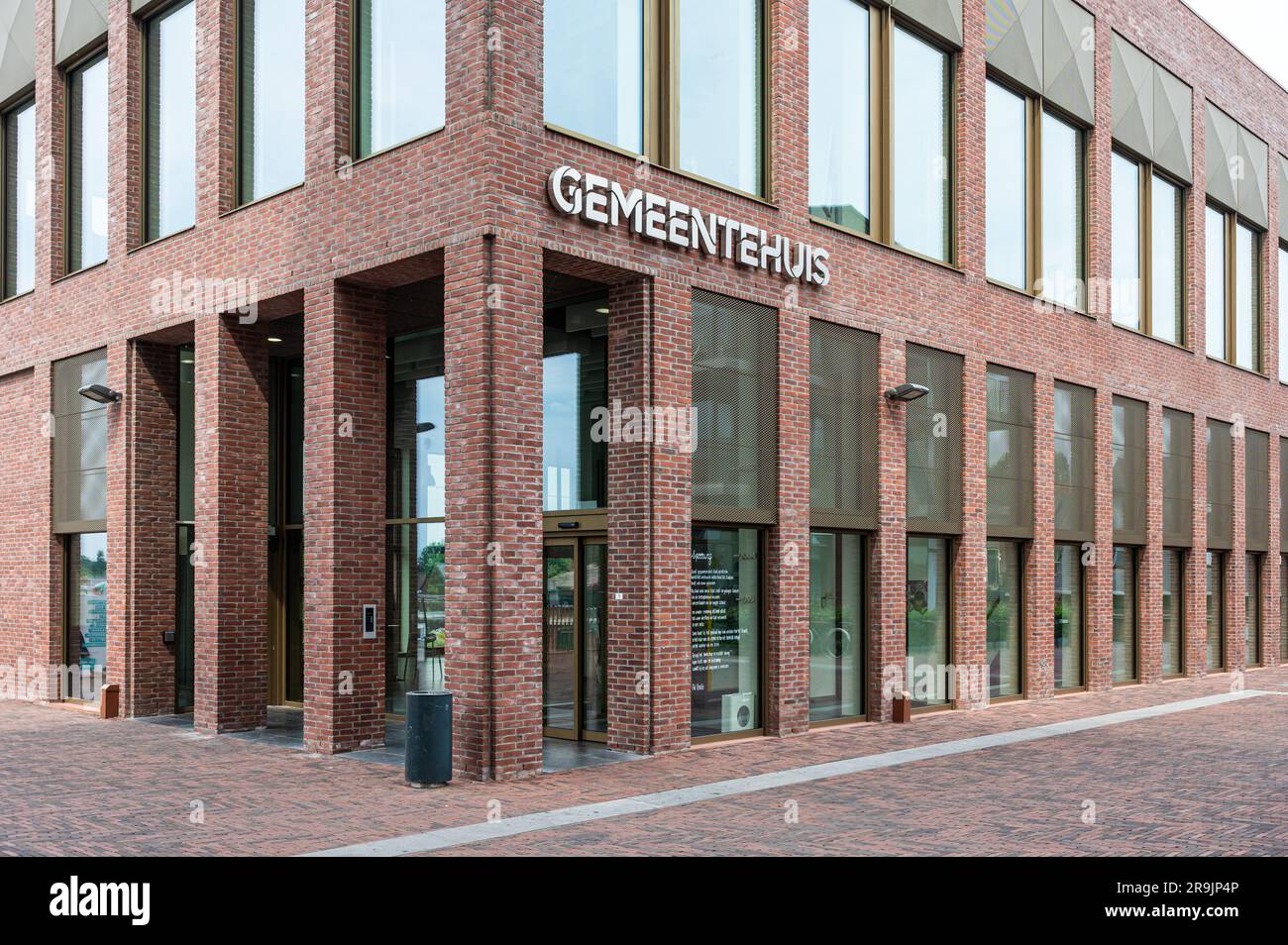 Wetteren, East Flemish Region, Belgium, June 16, 2023 - Contemporary brick stone facade of the city hall Stock Photo