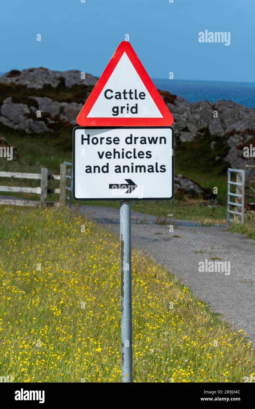 Horse drawn vehicles and animals road sign near Vaul settlement, Isle of Tiree. Stock Photo