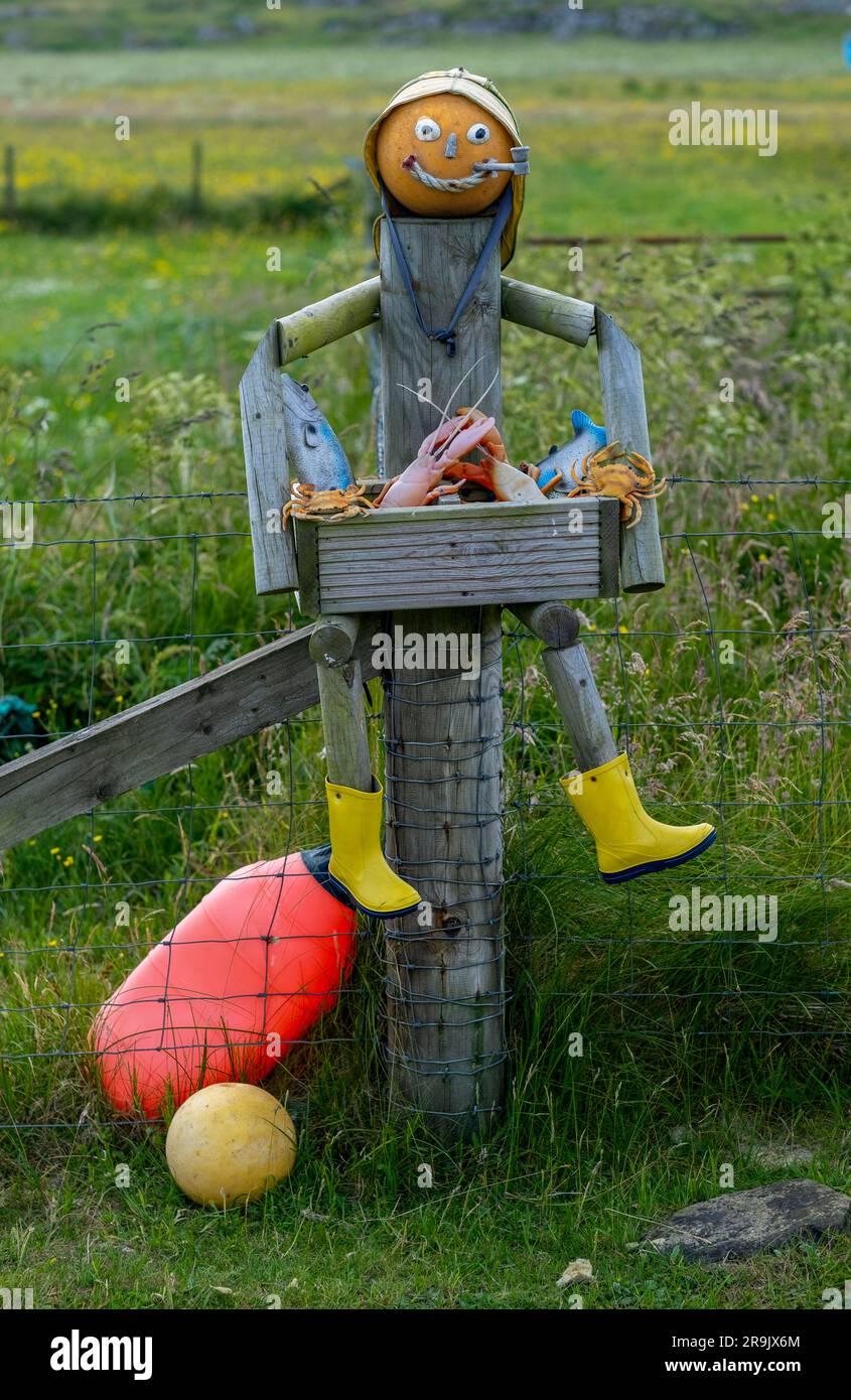 Lobster fisherman garden artwork, Vaul, Isle of Tiree, Inner Hebrides, Scotland. Stock Photo