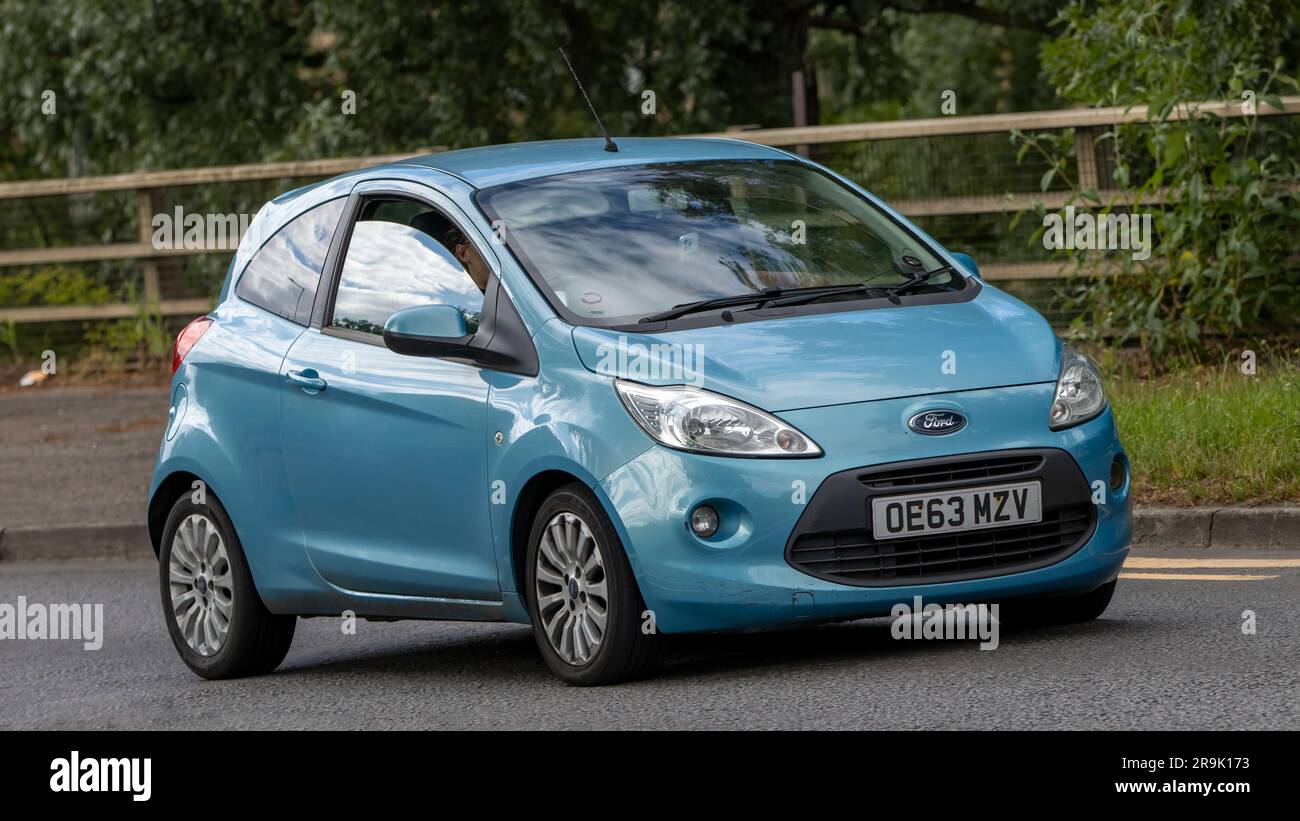 Milton Keynes,UK - June 24th 2023. 2014 blue FORD KA travelling on an English country road Stock Photo