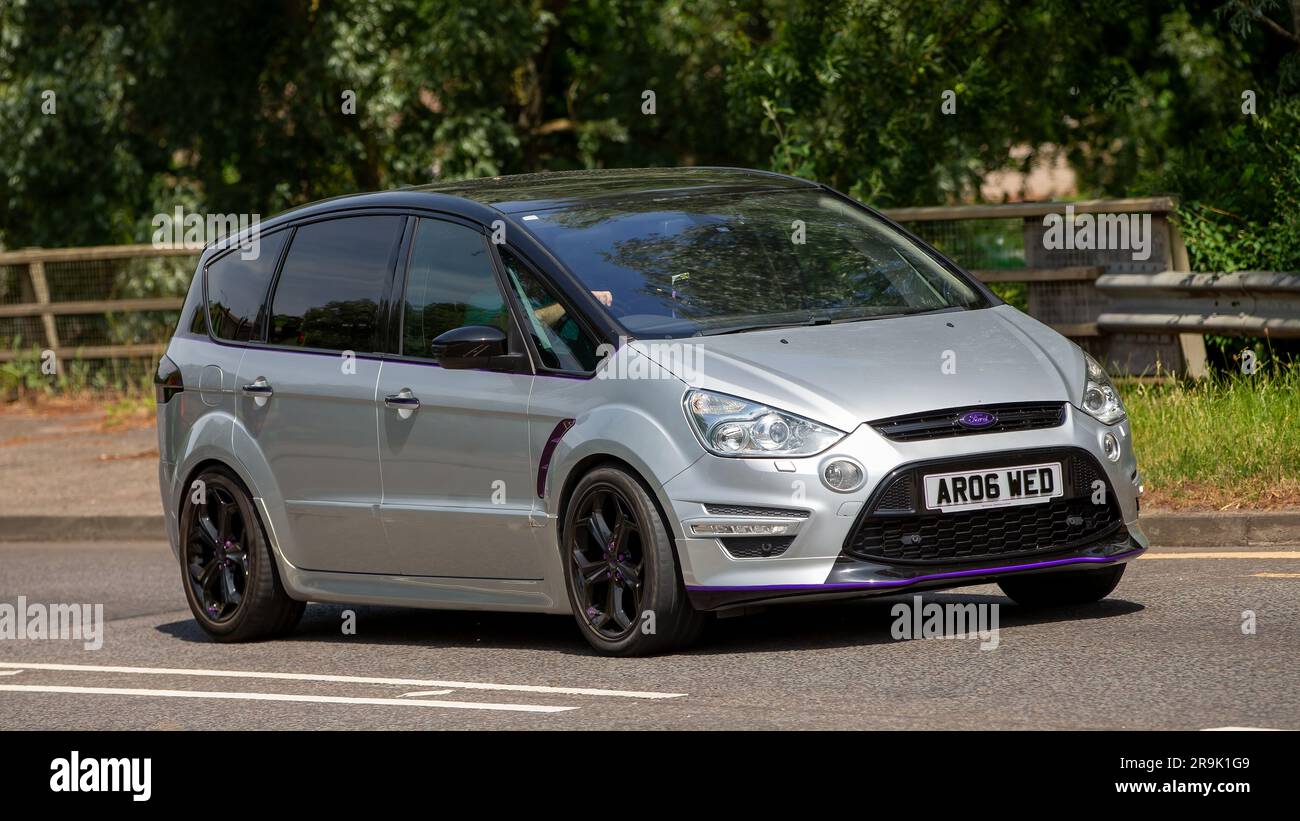Milton Keynes,UK - June 23rd 2023:  2010 silver FORD S-MAX TITANIUM X SPORT A car travelling on an English road Stock Photo