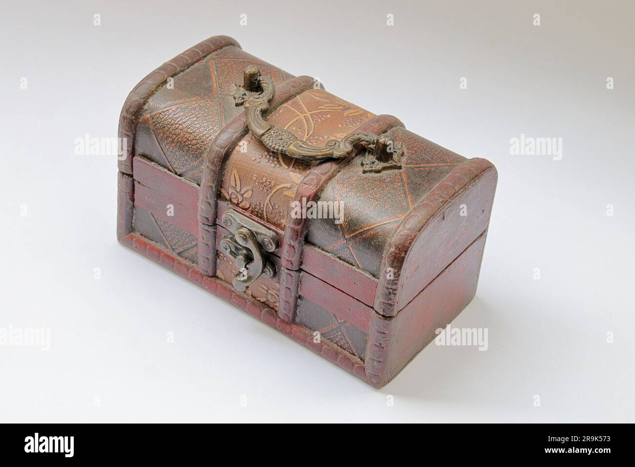 The photo shows an old jewelry box made of wood and leather Stock Photo