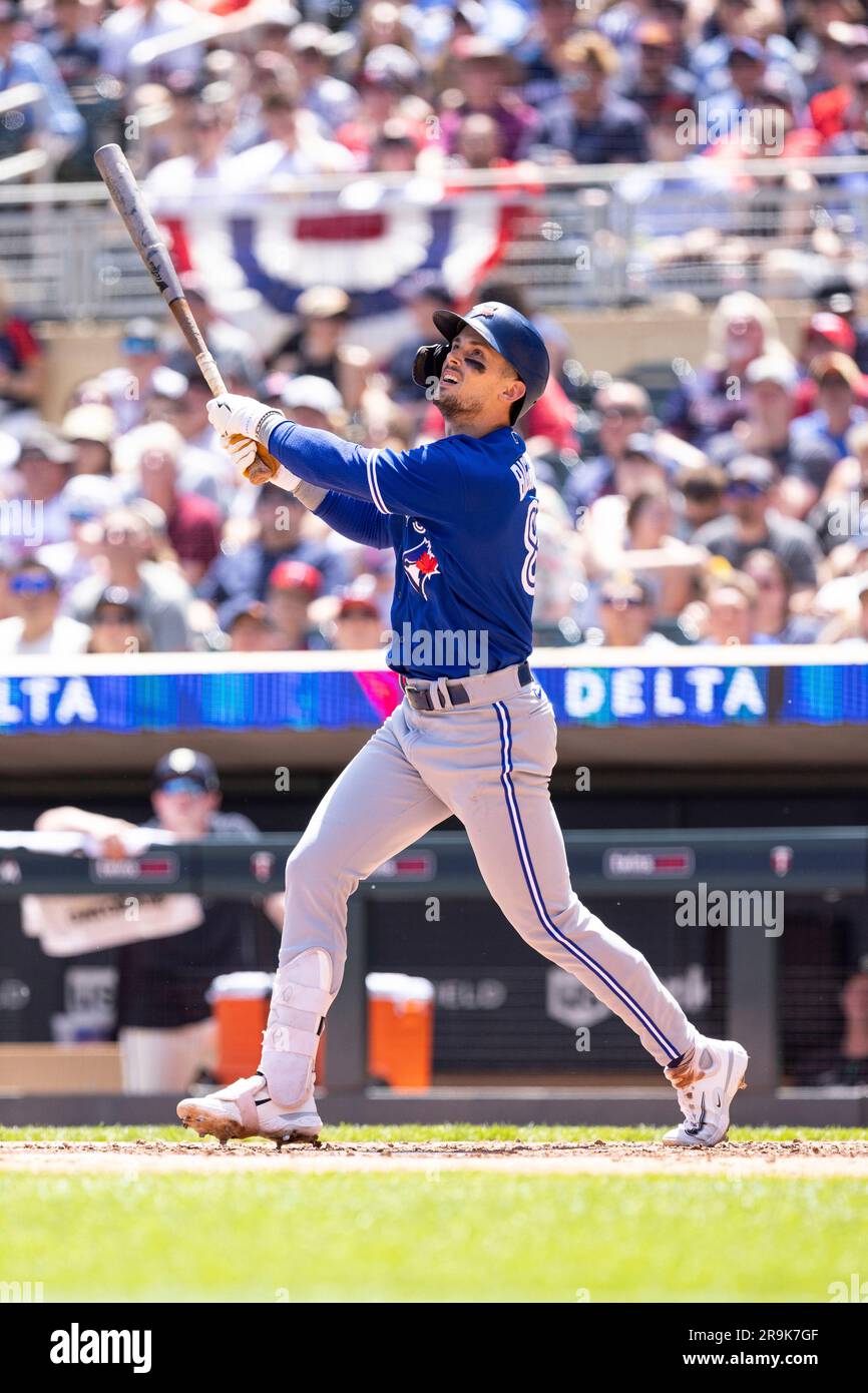 Toronto Blue Jays second baseman Cavan Biggio (8) throws to first base  during a spring training baseball game against the Baltimore Orioles on  March 1, 2023 at Ed Smith Stadium in Sarasota