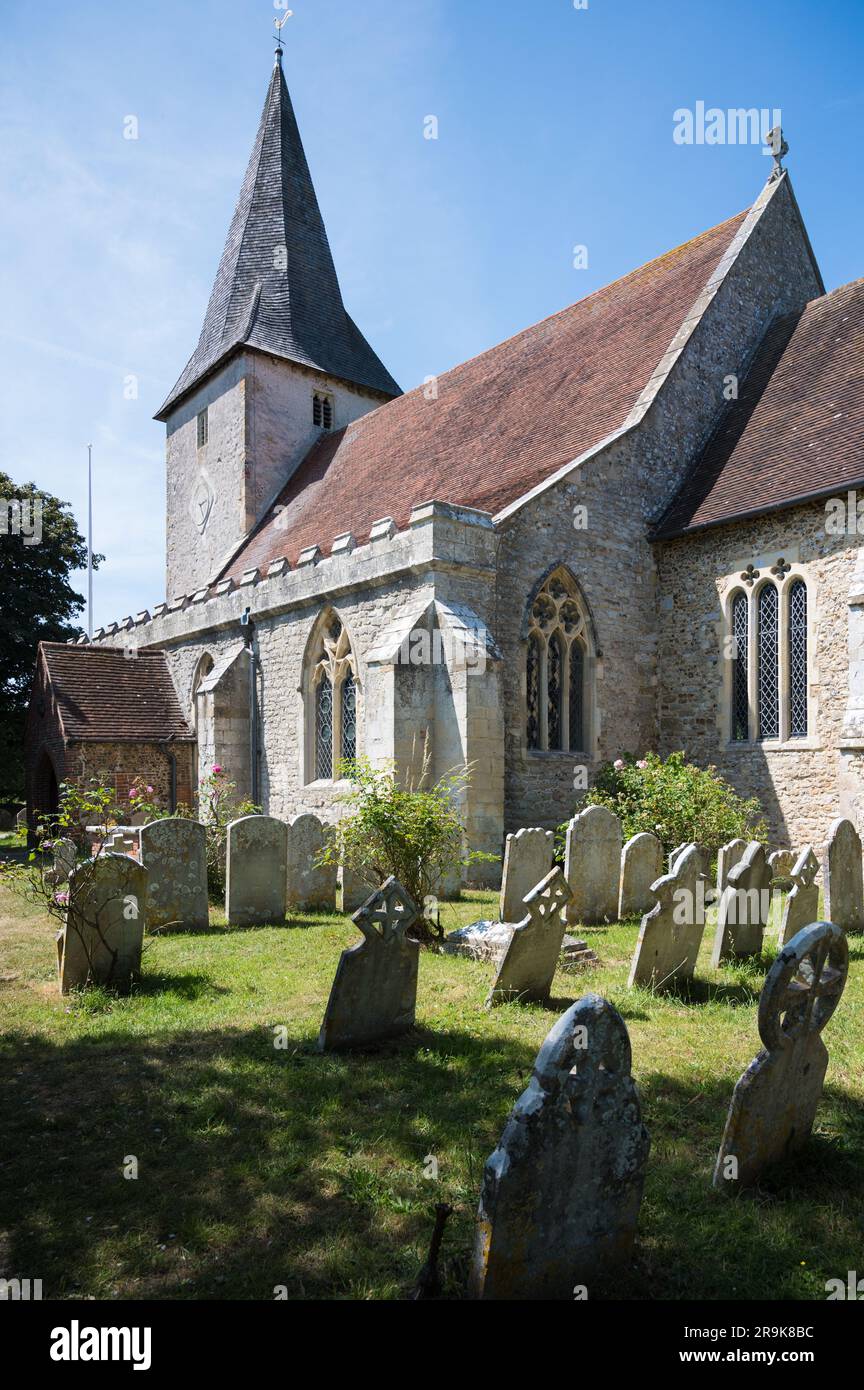 Exterior of Holy Trinity Church, a Grade l listed Anglican church. Some parts of the building date from Saxon times. Bosham, West Sussex, England, UK Stock Photo