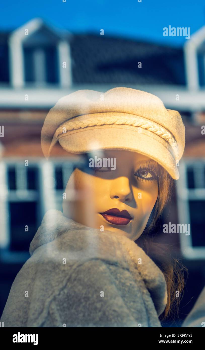 Female mannequin in a shop window Stock Photo - Alamy