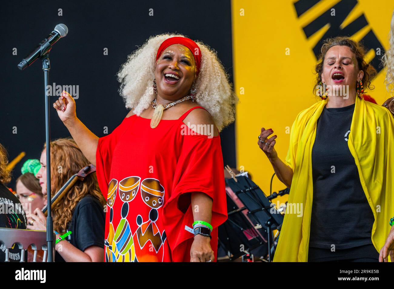 The Bristol Reggae Orchestra featuring the Windrush Choir on the Pyramid Stage in the week that marks 75 years since the arrival of HMT Empire Windrush - Sunday at the 2023 Glastonbury Festival, Worthy Farm, Glastonbury. Stock Photo