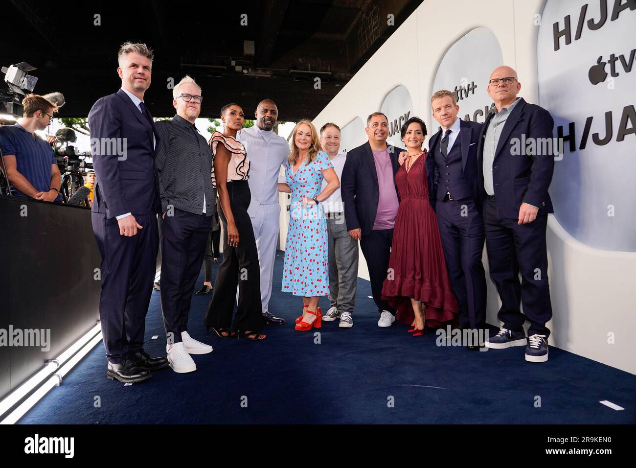 The cast of Hijack pose for a group picture at the premiere, in London