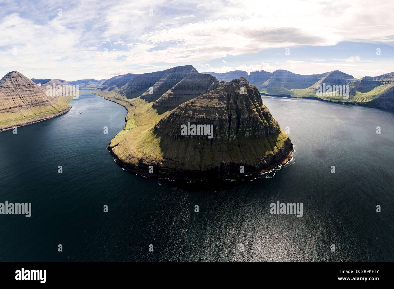 Panoramic of mountains and cliffs along the fjord in summer, aerial view, Muli, Bordoy island, Faroe Islands, Denmark Stock Photo