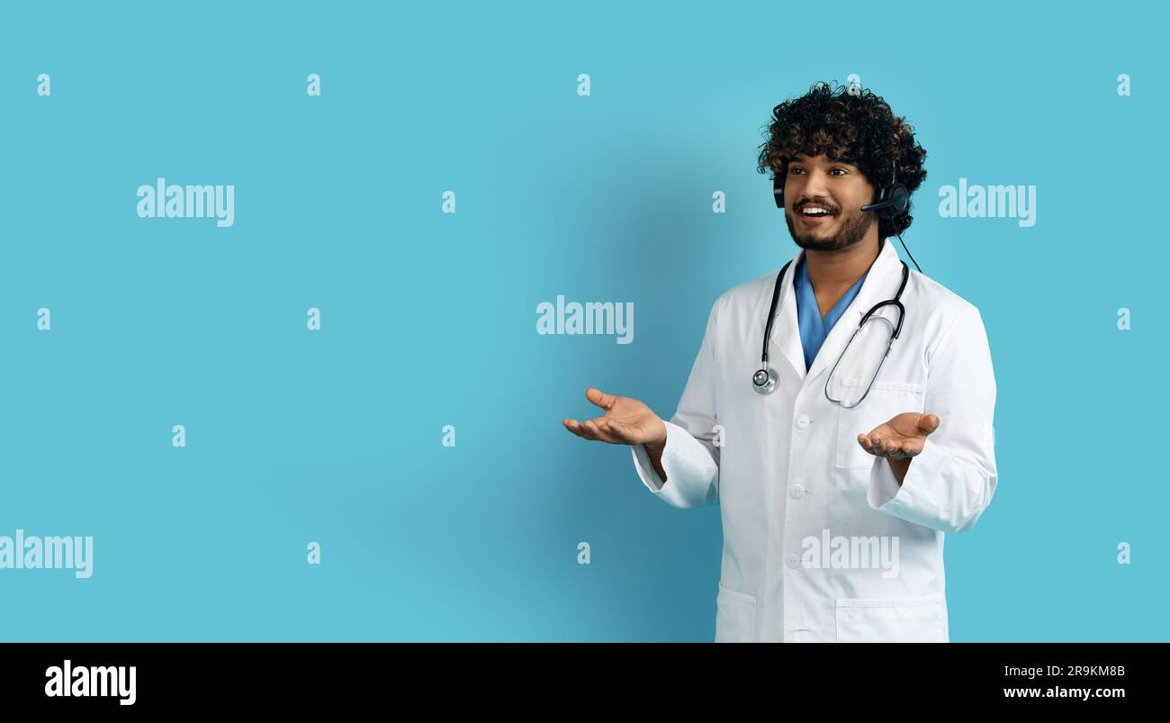 Indian male doctor using mobile hi-res stock photography and images - Alamy