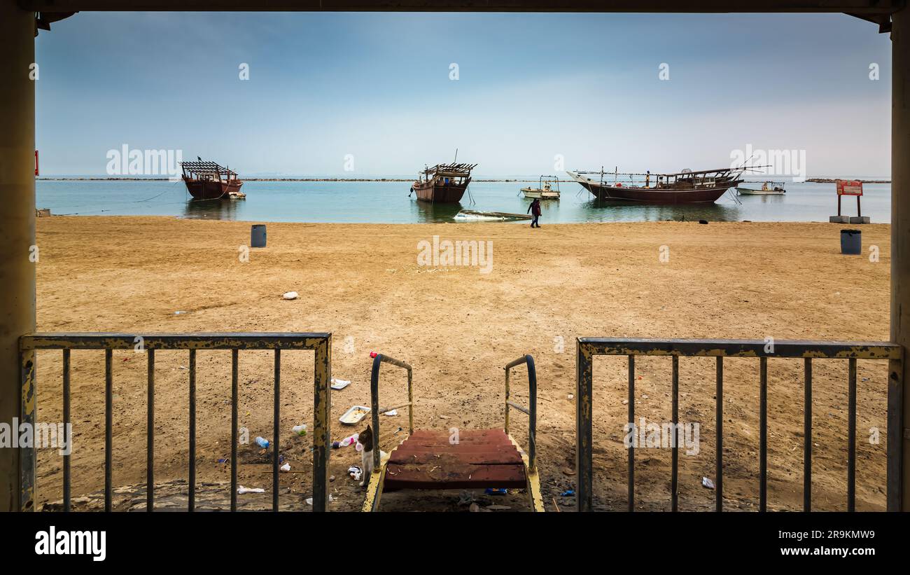 The Dammam Sea is a beautiful sight in the morning, and creates a peaceful atmosphere.The boat adds a touch of adventure and curiosity to the scene. Stock Photo