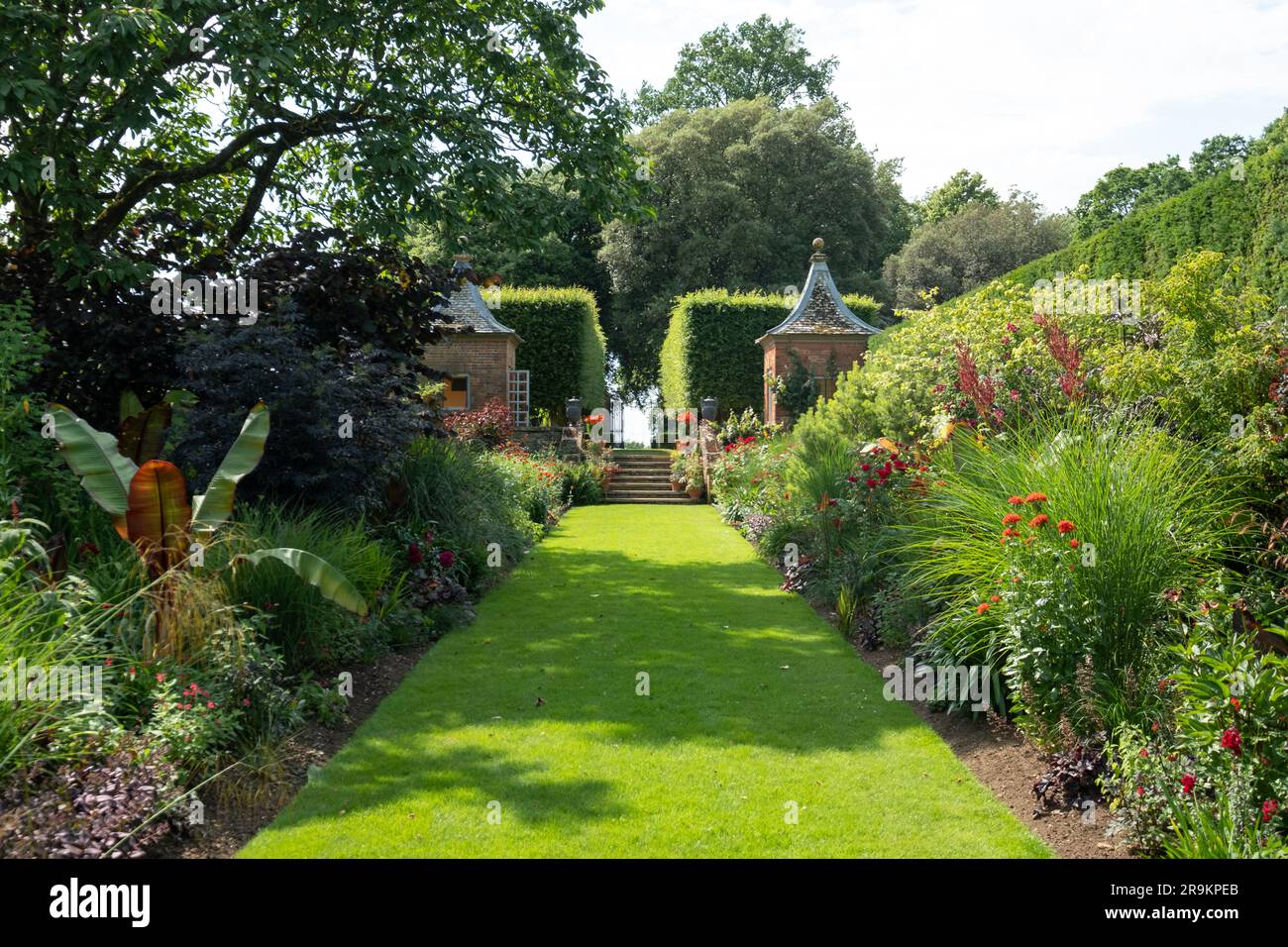 Gazebos at the end of the Red Border in the Arts and Crafts inspired