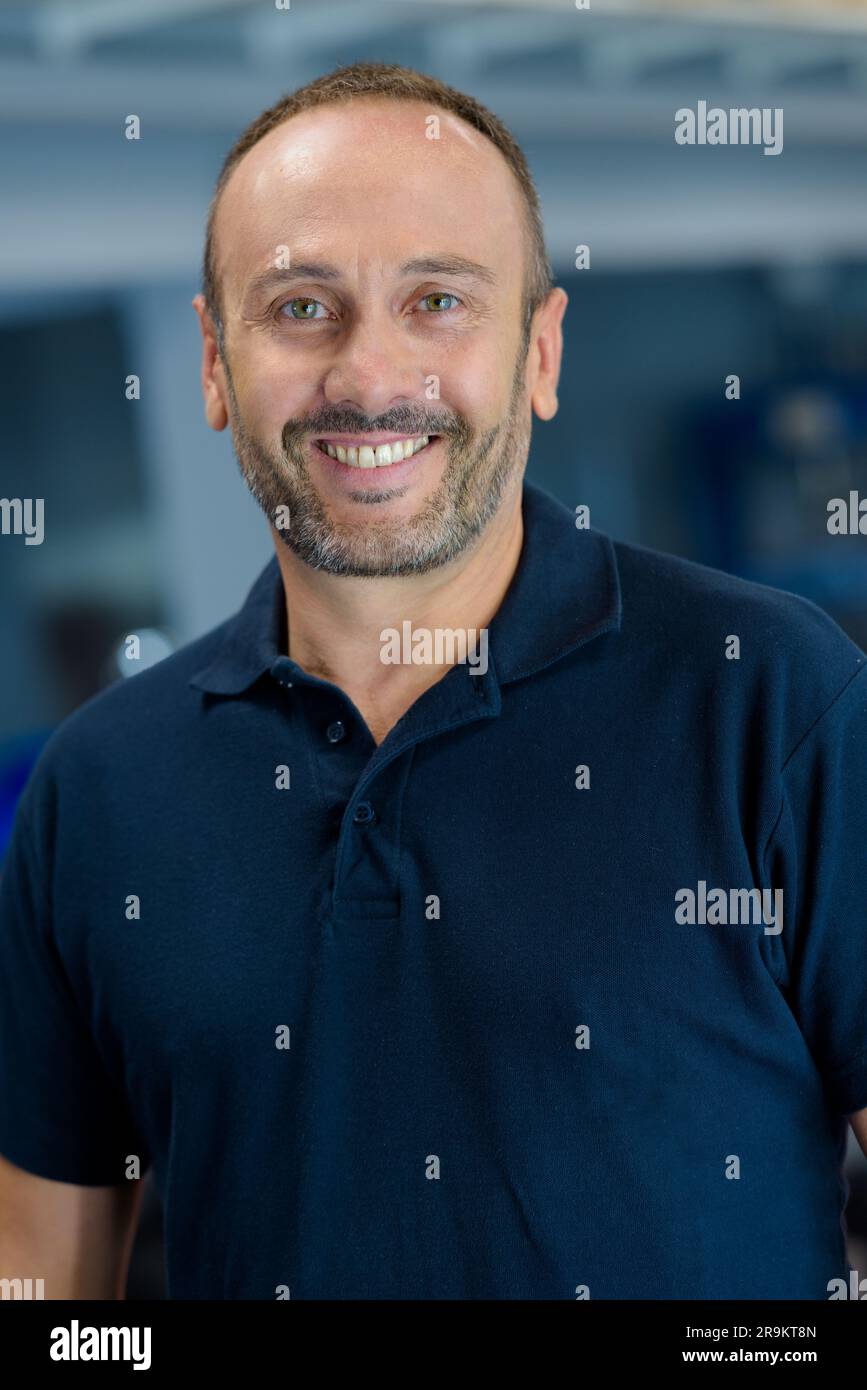 Man in working uniform turning hi-res stock photography and images - Alamy