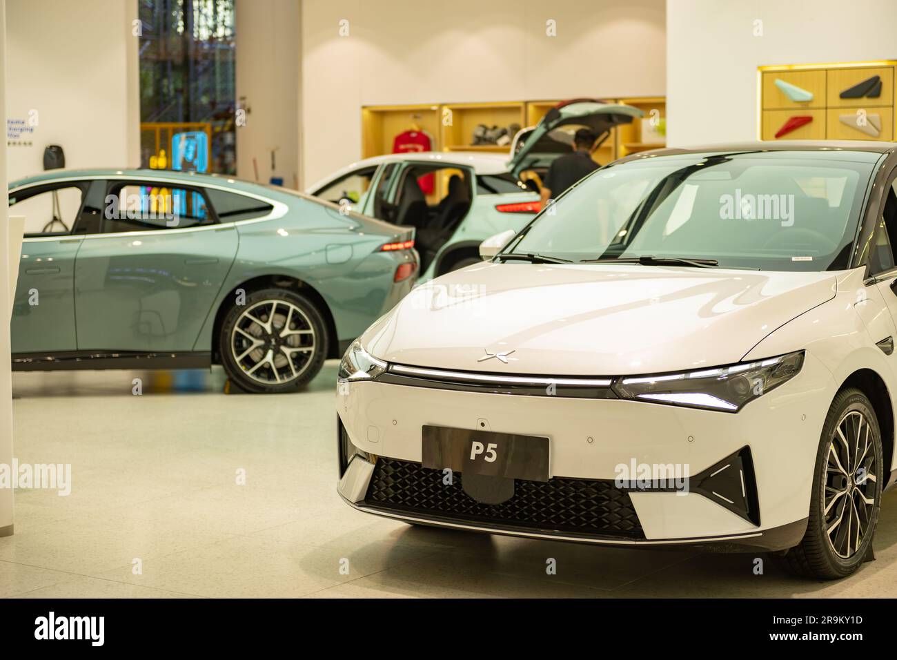 ZHONGSHAN GUANGDONG China-June 22 2023:Xiaopeng P5 electric car in a shopping mall. Stock Photo