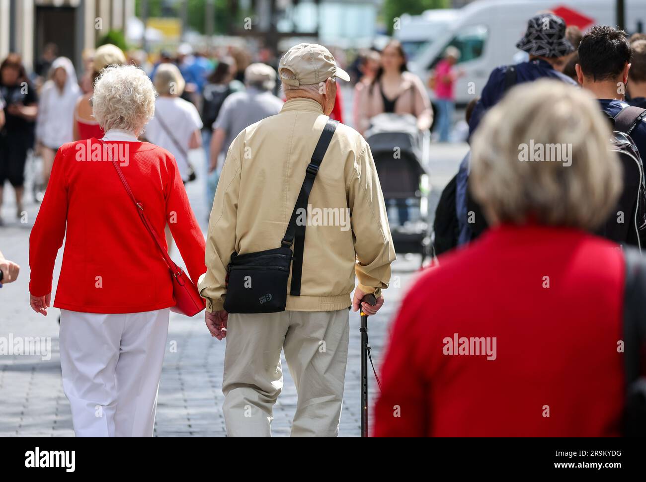Leipzig, Germany. 27th June, 2023. Senior citizens go shopping through downtown Leipzig. The approximately 21 million pensioners in the country will receive more money starting in July. With the annual pension adjustment, old-age pensions will rise by 4.39 percent in the west and 5.86 percent in the east. In addition, almost 30 years after reunification, the so-called pension value in the east will be brought into line with that in the west - one year earlier than planned. Credit: Jan Woitas/dpa/Alamy Live News Stock Photo