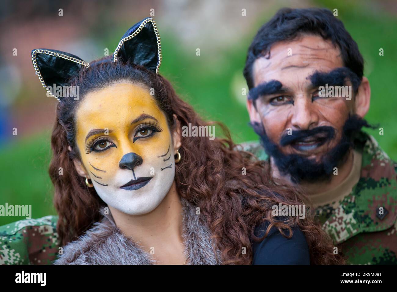 Young couple wearing wolf and woodcutter costumes. Real family having fun  while using costumes of the Little red riding hood tale in Halloween Stock  Photo - Alamy