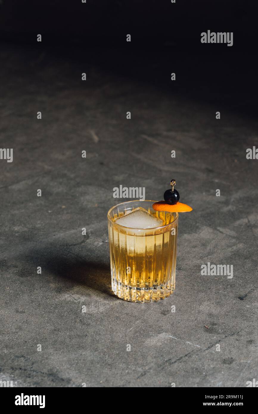 Whiskey soda highball cocktail in crystal double old fashioned glass