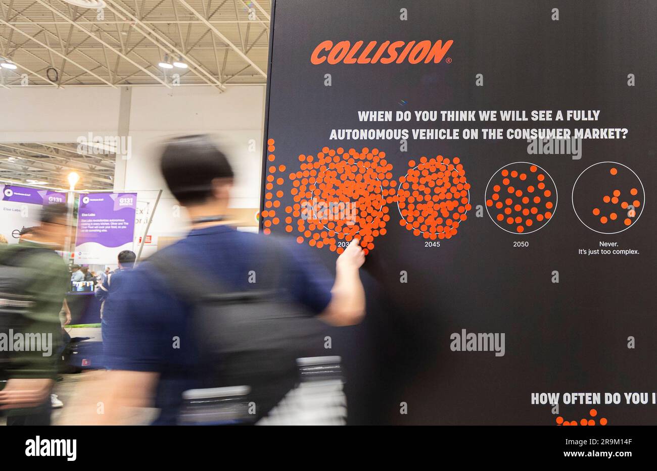 Toronto, Canada. 27th June, 2023. A man takes part in a fully automonous vehicle's survey during the 2023 Collision Conference in Toronto, Canada, on June 27, 2023. The 2023 Collision Conference, an annual tech conference in North America, is held here from June 26 to June 29 this year. Credit: Zou Zheng/Xinhua/Alamy Live News Stock Photo